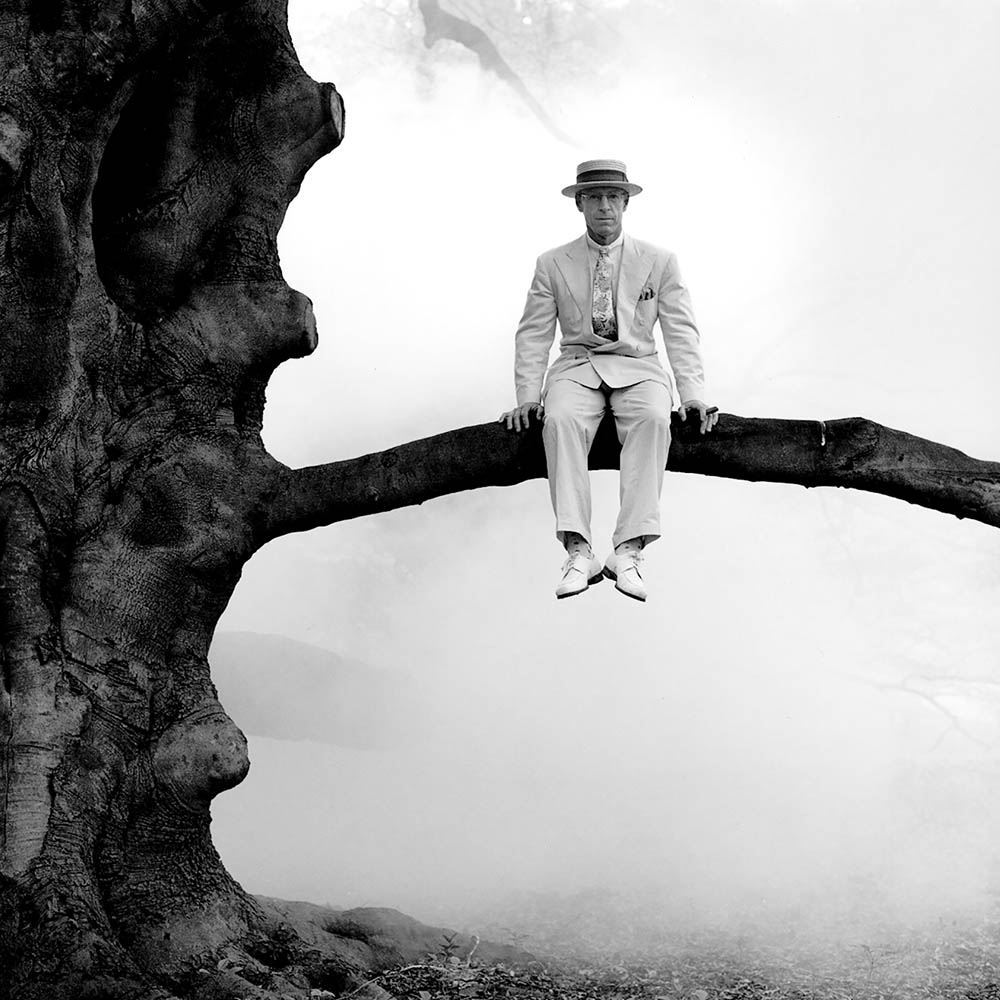 Dick on Tree Limb, Snedens Landing, New York, 1996© Rodney Smith
