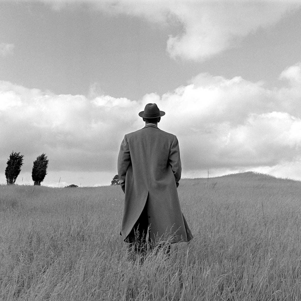 A.J. From Behind in Field, Harriman, New York, 1994© Rodney Smith