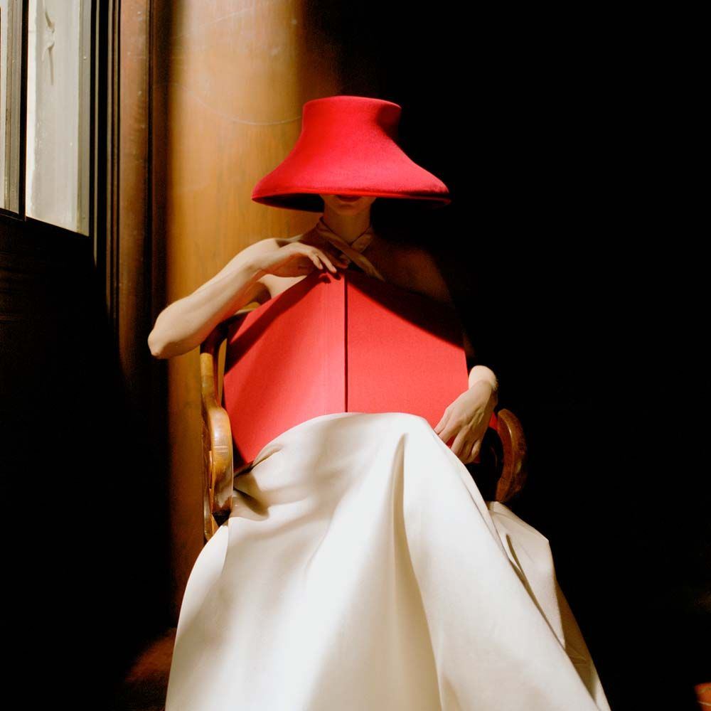 Bernadette in Red Hat with Book, New York Public Library, New York City, New York, 2003© Rodney Smith