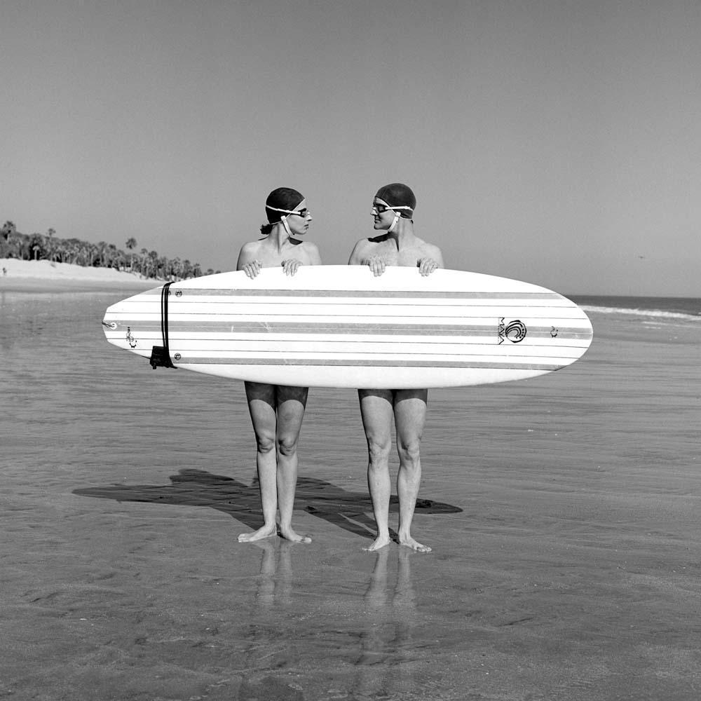 Man and Woman Behind Surfboard, Charleston, South Carolina, 2000© Rodney Smith