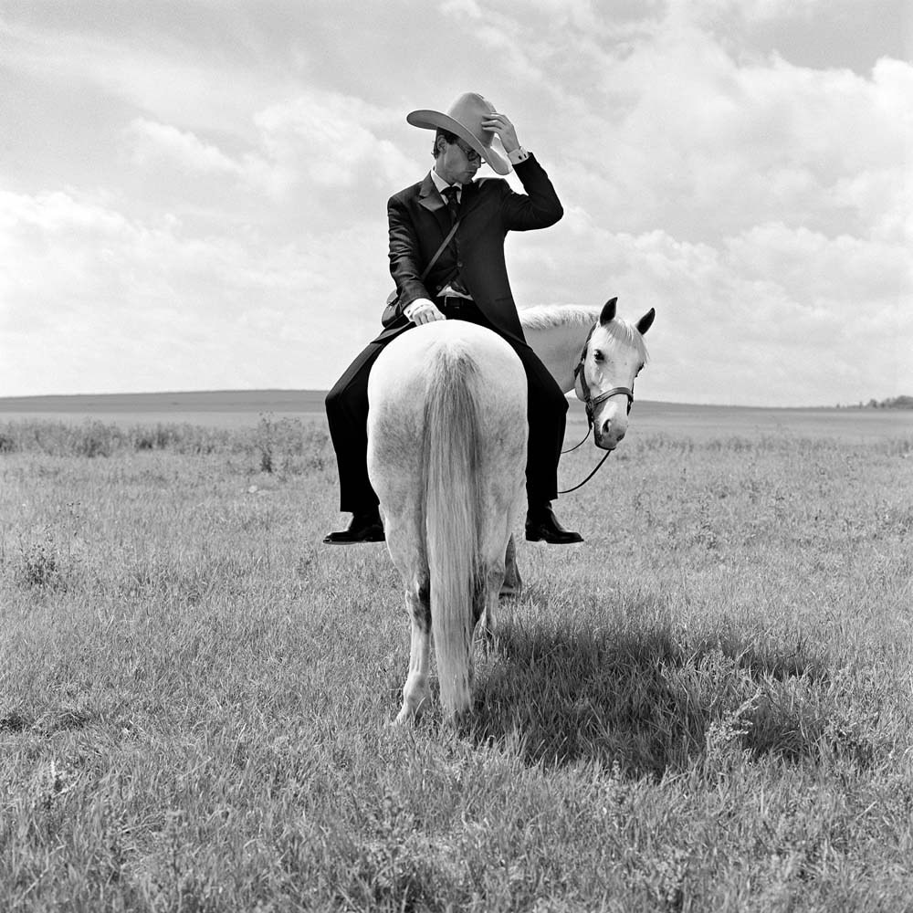 Greg on Horse Backwards, Alberta, Canada, 2004© Rodney Smith
