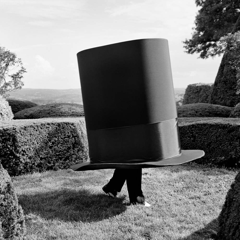 Man Inside Giant Top Hat, Amenia, New York, 2014© Rodney Smith