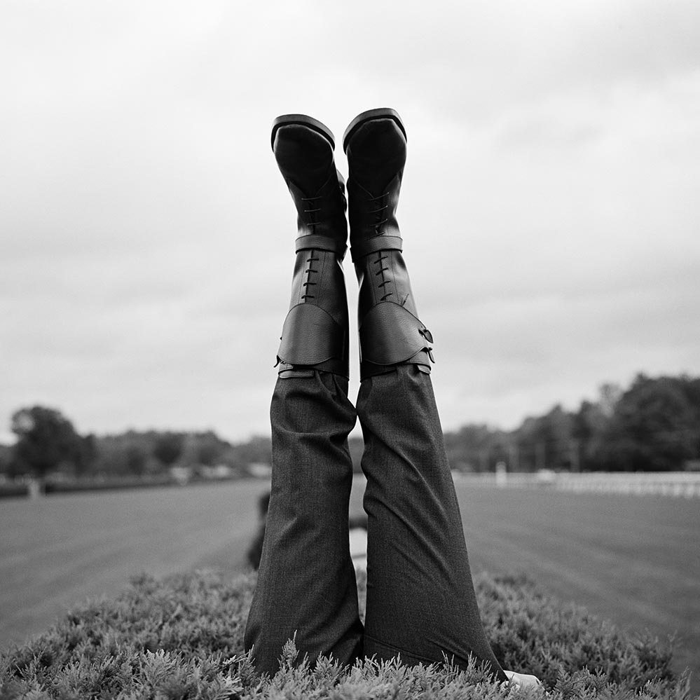George Upside Down in Hedge, Saratoga Springs, New York, 2008© Rodney Smith