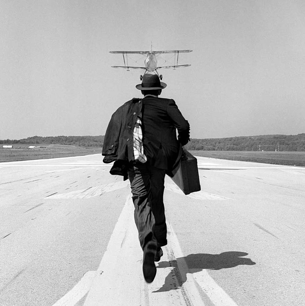 AJ Chasing Airplane, Orange County Airport, New York, 1998© Rodney Smith