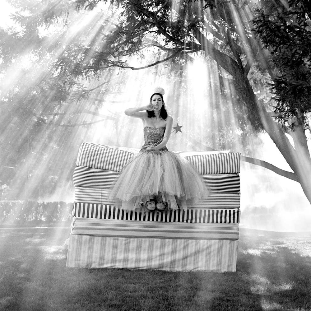 Zoe on top of Mattress Stack, Snedens Landing, New York, 2007© Rodney Smith