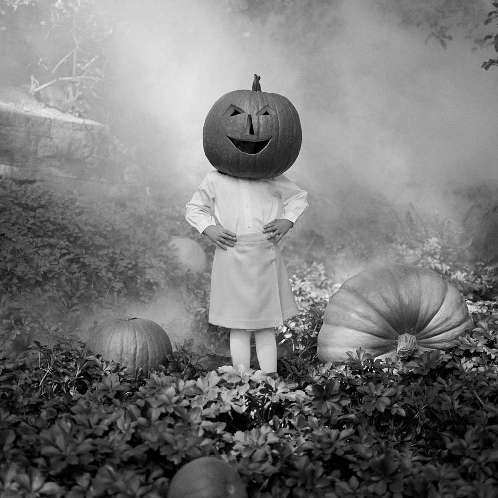 Mia with a Pumpkin Head, Snedens Landing, New York, 2003© Rodney Smith