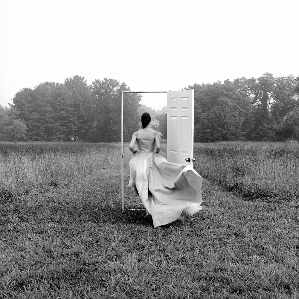 Caroline Running through Doorway, Monkton, Maryland, 1999© Rodney Smith