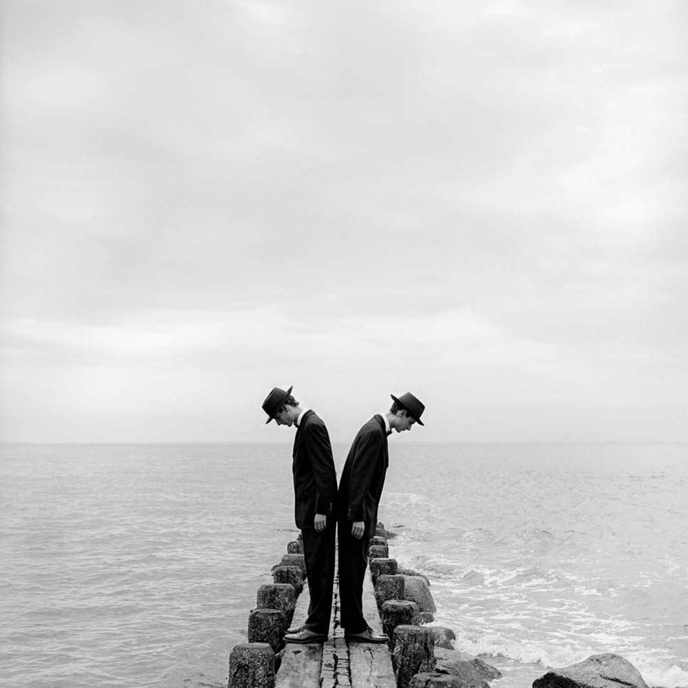 Twins Leaning Outward on Dock No. 1, Sherwood Island, Connecticut, 1997© Rodney Smith