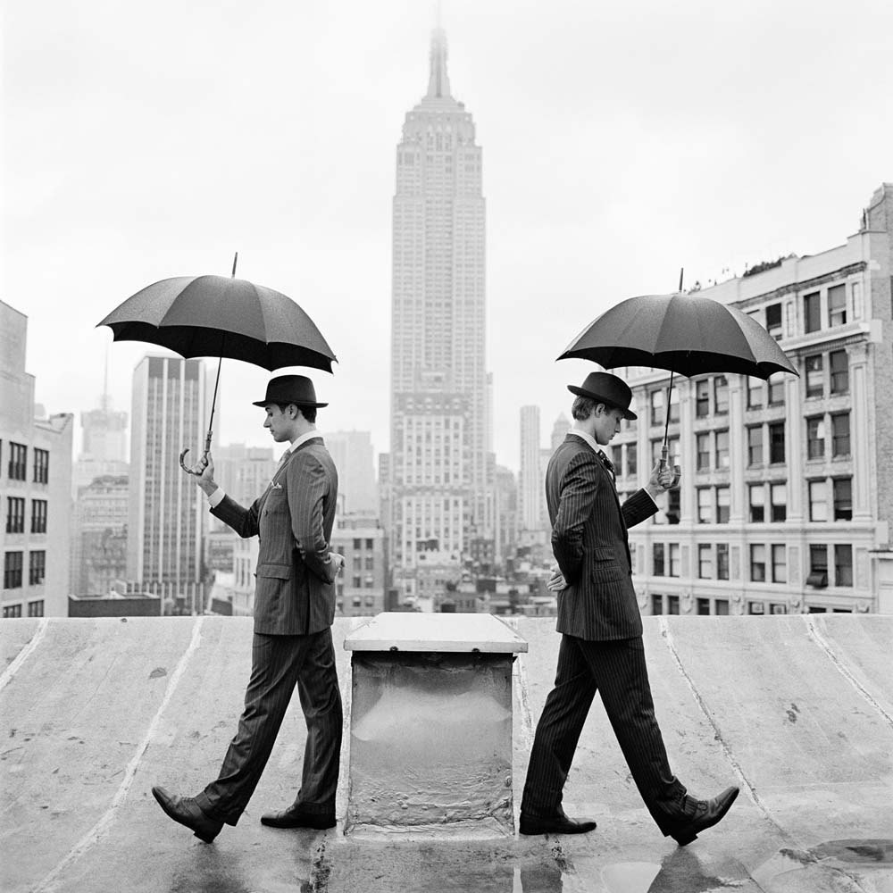 Reed and Nathan with Umbrellas on Rooftop, New York, New York, 2011© Rodney Smith