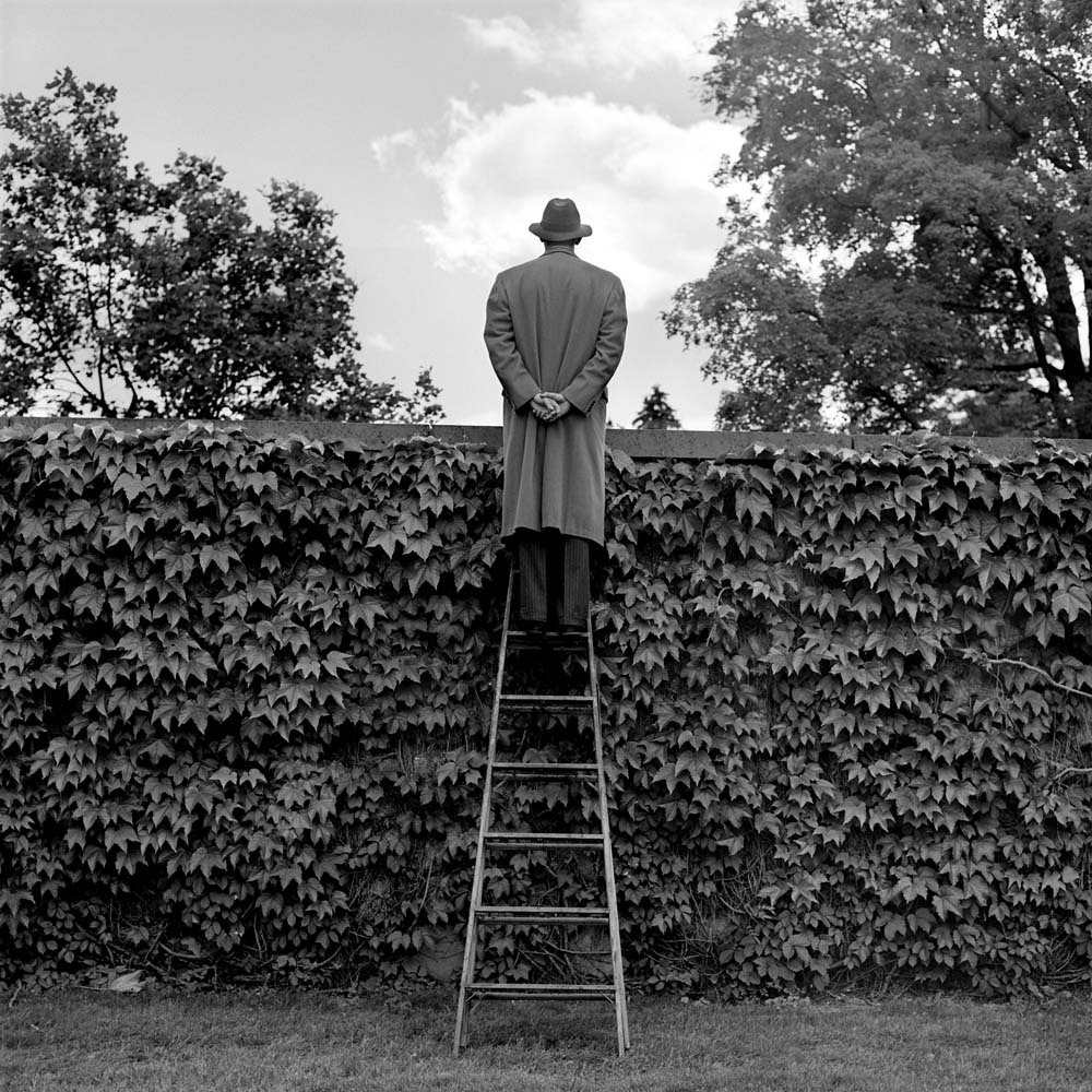 AJ Looking over Ivy-Covered Wall, Harriman, New York, 1994© Rodney Smith
