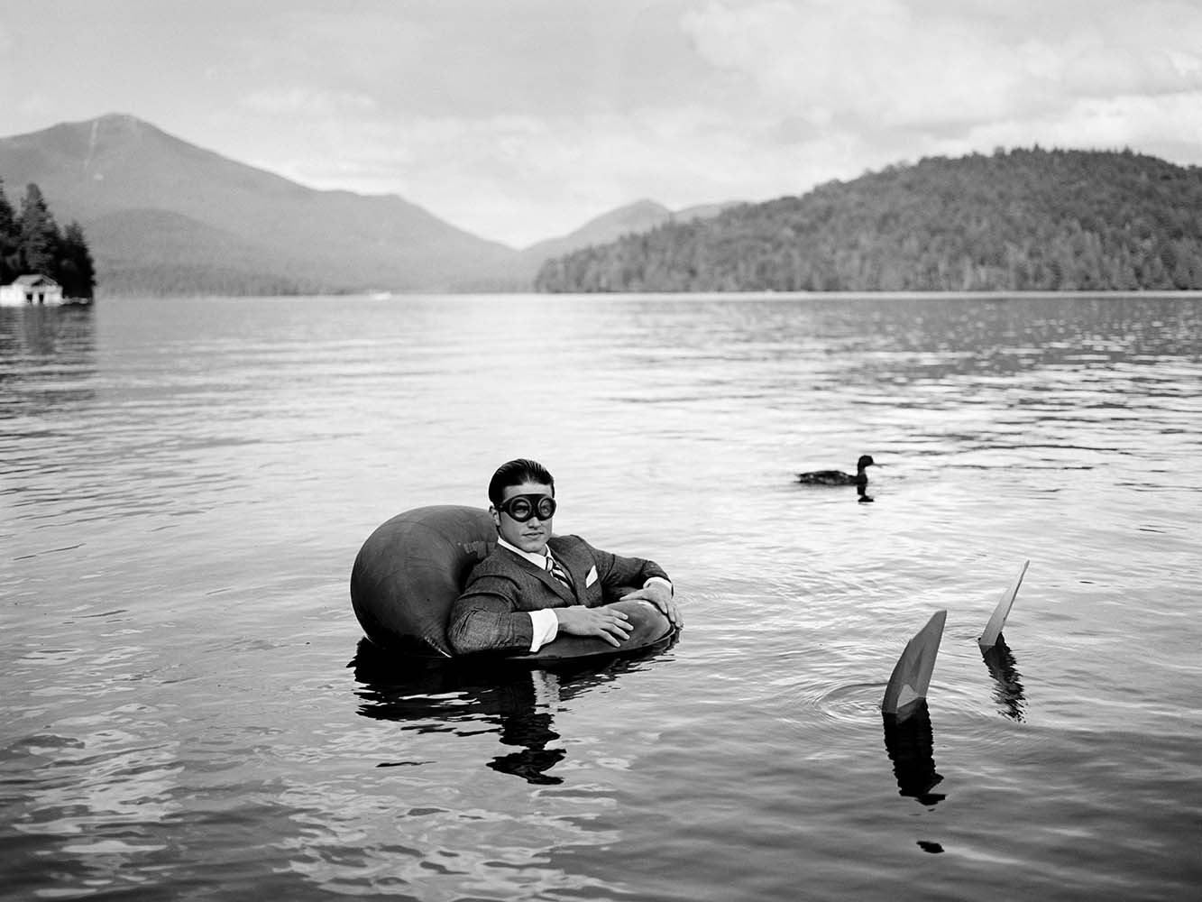 James in  Innertube with Duck,  Lake Placid, New York, 2006© Rodney Smith