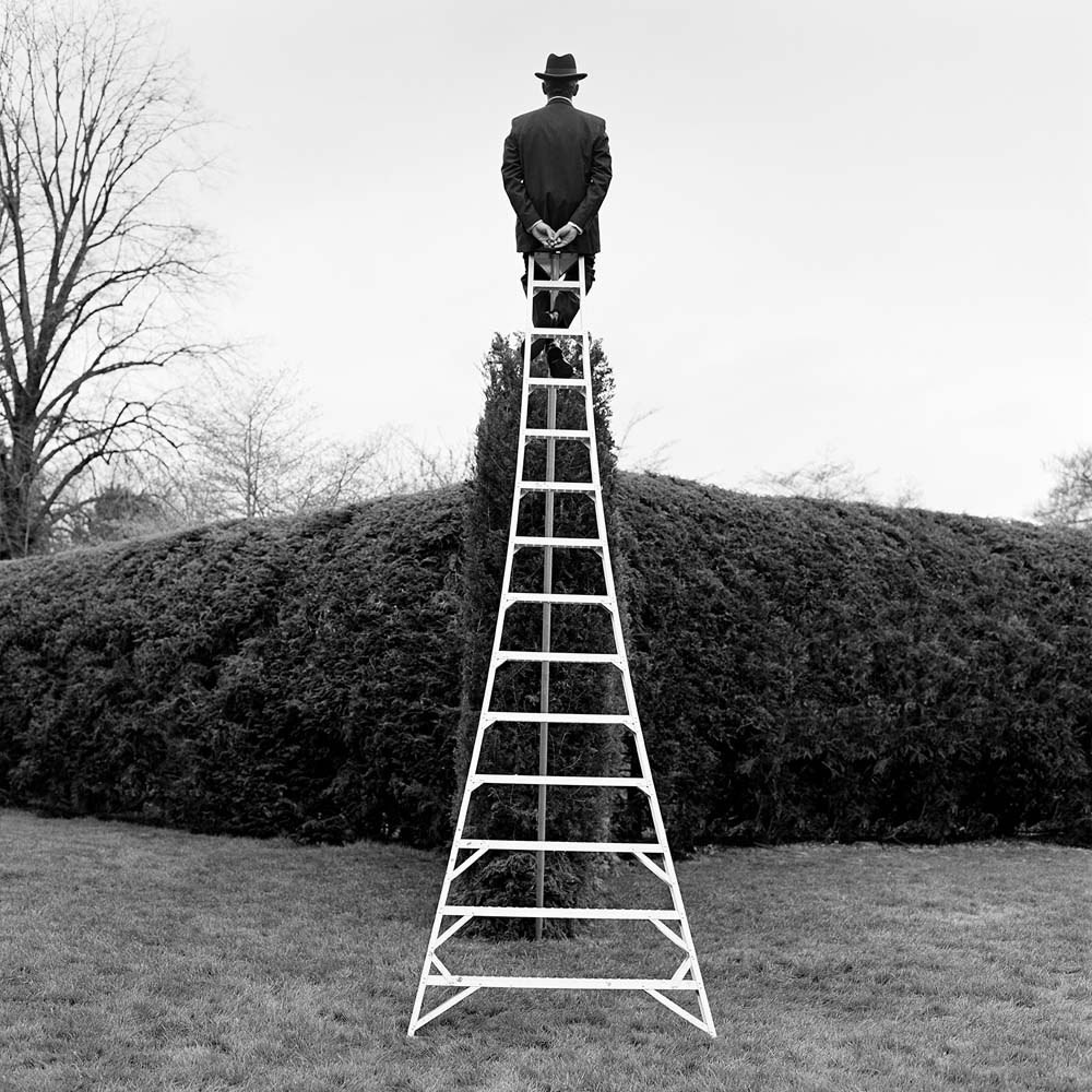 AJ Seated on Ladder from Behind, Long Island, New York, 2000© Rodney Smith